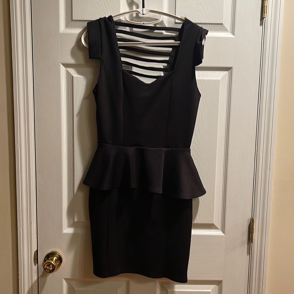 Arden B large open back black pebleam dress